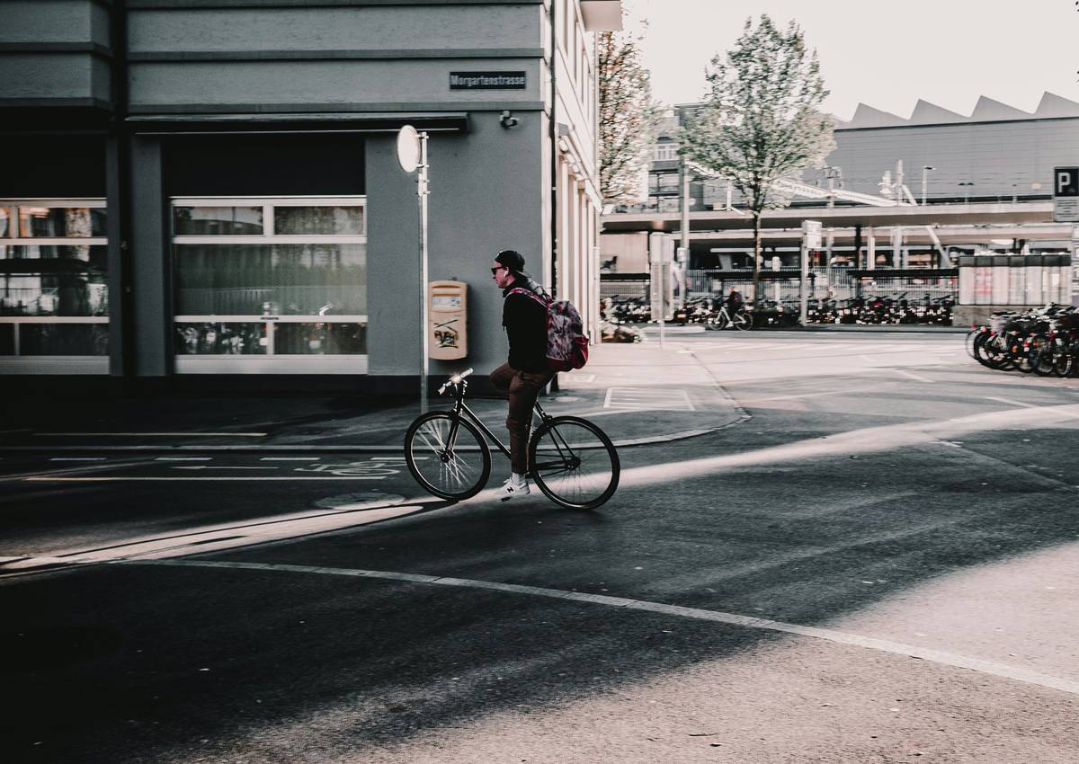 Color-coded City Bike Lane Maps showing protected lanes, shared paths, and e-bike routes in an urban downtown grid