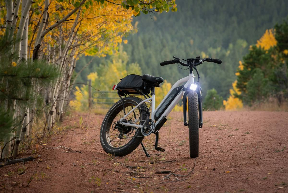 Solo traveler overcoming City Cycling Challenges with ebike on scenic urban trail
