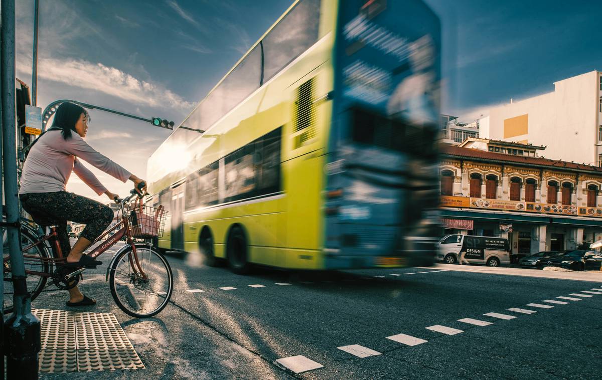 Rider boarding a city bus with an ebike, demonstrating Public Transport Integration in action
